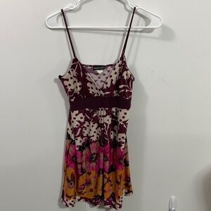 Wet Seal tank with spaghetti straps, very colorful, says Med see measurements